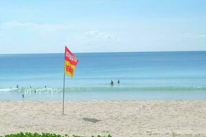 Flag waiting sea surf photo