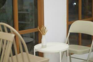 Table and chair in minimal cafe photo