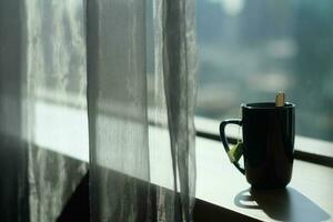 coffee cup with a window in the morning photo