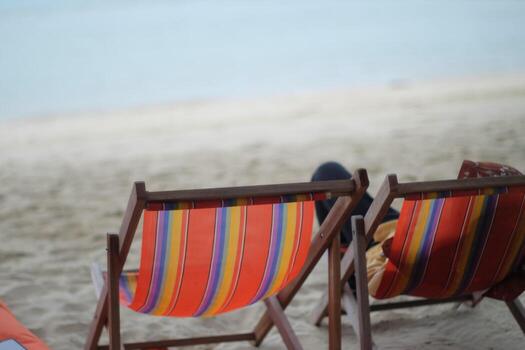 Beach chair on the beach, shallow depth of field, soft focus photo