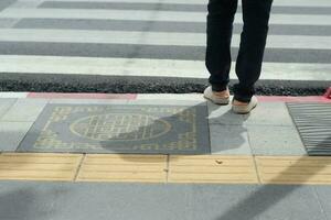 man walking in the city photo