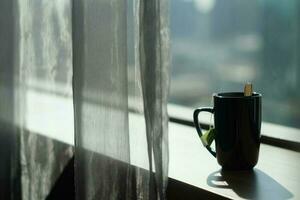 coffee cup with a window in the morning photo