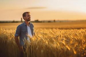 Man standing in a wheat field. photo