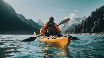 Rear view of woman riding kayak in stream with background of beautiful landscape. photo