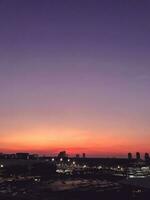Urban sunset. Sky background photo