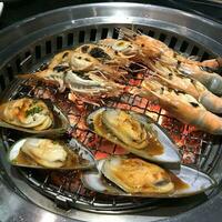seafood buffet at restaurant with shrimp and mussels photo