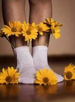 summer in socks feet with flowers photo