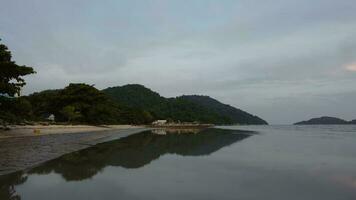 Slow move over reflection coastal Permatang Damar Laut video