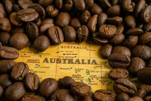 Bangkok, Thailand March 14, 2023 Coffee bean on Australia map, import export trade online commerce concept. photo