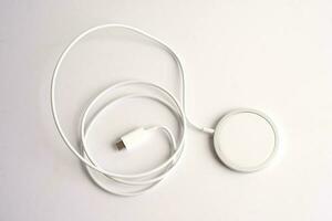 Wireless charger, magnetic charging modern equipment of mobile phone. photo