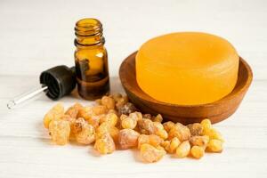 Frankincense or olibanum aromatic resin and soap for used in incense and perfumes. photo