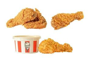 Bangkok, Thailand August 01, 2022 KFC Chicken, Kentucky Fried Chicken with brand logo, fast food isolated on white background. photo