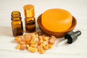 Frankincense or olibanum aromatic resin and soap for used in incense and perfumes. photo