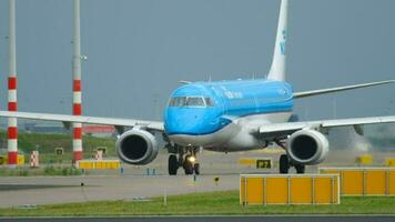 AMSTERDAM, THE NETHERLANDS JULY 25, 2017 - KLM Cityhopper Embraer 190 PH EZP taxiing before departure at runway 36L Polderbaan. Shiphol Airport, Amsterdam, Holland video