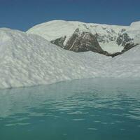 Paradise bay glaciers and mountains, Antartic peninsula, Antartica.. photo