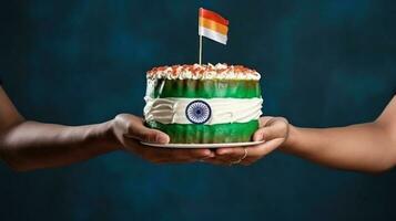 Hand holding India flag photo