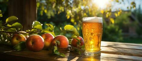 Apple cider on table with apples photo