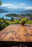 Wood table on close up lake blur on the background. Natural afternoon sunlight. photo