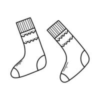 Socks in doodle style. Linear pair of warm socks. Vector illustration.