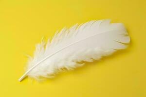 Close up of bright white feather. Copy space, yellow background. Fashion and Party concept. AI Generative photo