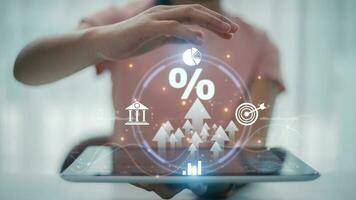 Women with percentage symbol and up arrow, Interest rates continue to increase, return on stocks and mutual funds, long term investment for retirement. Interest rate and dividend concept. photo