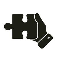 Jigsaw Part in Hand, Success Merge Solid Sign. Problem Solving, Solution, Strategy and Oneness Concept Glyph Pictogram. Human Hand Holds Puzzle Piece Silhouette Icon. Isolated Vector Illustration.