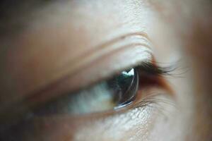 close-up of asian eyes, pupils, eyelids, eyelashes photo