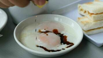 soft boiled eggs in a bowl with toast and a spoon video