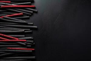 Delicious licorice dark background with empty space for text photo