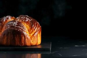 Delicious Brioche dark background with empty space for text photo