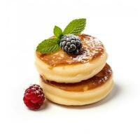 couple of puff cottage cheese pancakes with berries isolated on white background photo