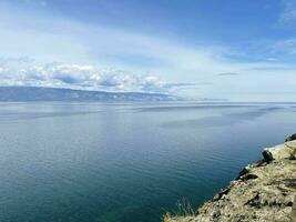 Small sea strait on a sunny summer day, Lake Baikal, Russia photo