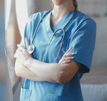 Asian doctor woman visited patient woman to diagnosis and check up health at home or private hospital. Female patient explain health problem and symptoms to doctor .Health care premium service at home photo