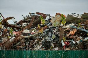 Metal waste dump for recycling photo