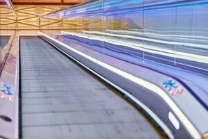 Moving walkway in shopping center photo