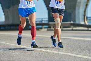 Running men on road photo