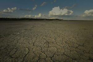 Broken dry soil in a Pampas lagoon, La Pampa province, Patagonia, Argentina. photo