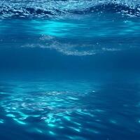 abstract blue water background with some smooth lines in it. photo