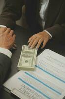 Business and lawyers discussing contract papers with brass scale on desk in office. Law, legal services, advice, justice and law concept picture with film grain effect photo