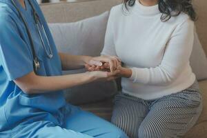 Mental health counselor. Young woman during therapy session talking with a psychologist in the office. photo