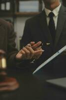 Customer service good cooperation, Consultation between a Businessman and Male lawyer or judge consult having team meeting with client, Law and Legal services concept. photo