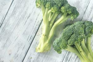 Broccoli on the wooden table photo