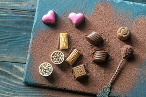 Chocolate candies with cocoa photo