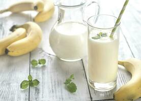 Glass of banana milk shake photo