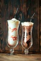 Two glasses of milkshake photo