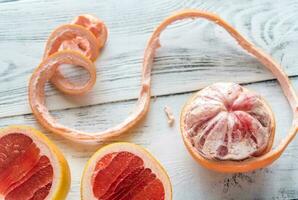 Peeled grapefruit flat lay photo