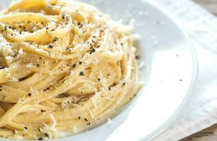 Cacio e Pepe - spaghetti with cheese and pepper photo