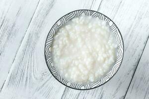 cuenco de congee - asiático arroz gachas de avena foto