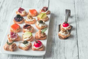 Crostini with different toppings photo