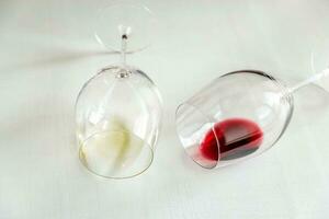 Glasses with red and white wine photo